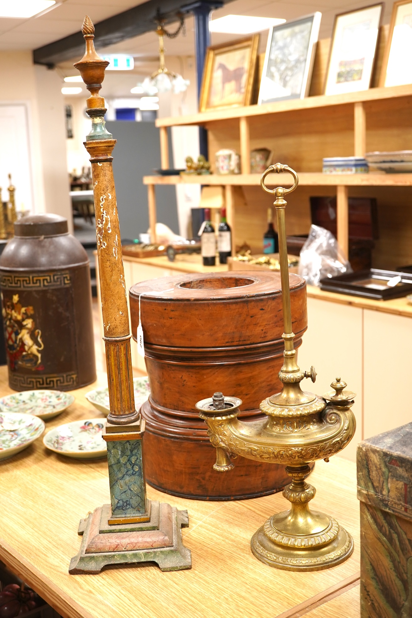 A brass ‘oil lamp’ lamp base and a polychrome painted wood pillar, 75cm